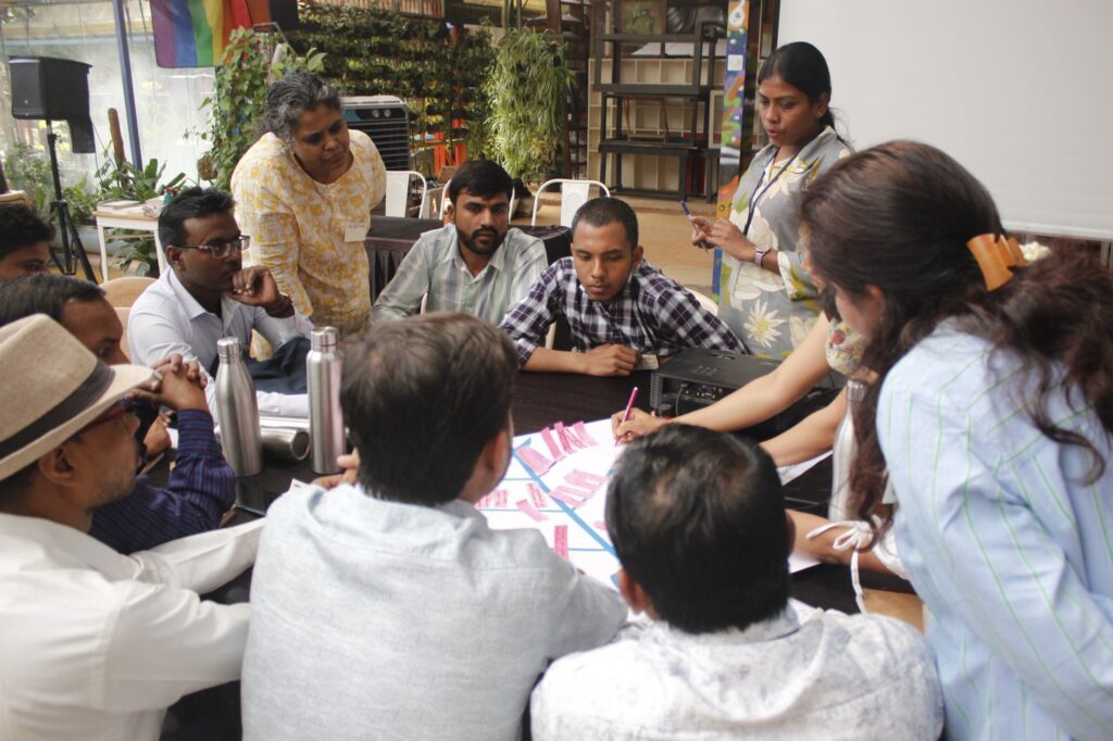 Participants in a group discussion at a Saahas workshop